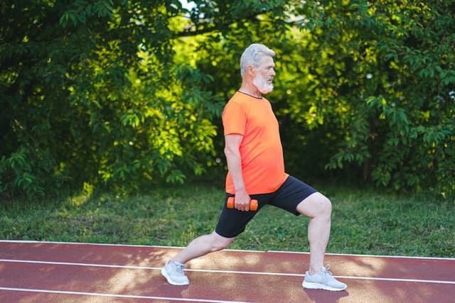 Senior man doing sport exercises