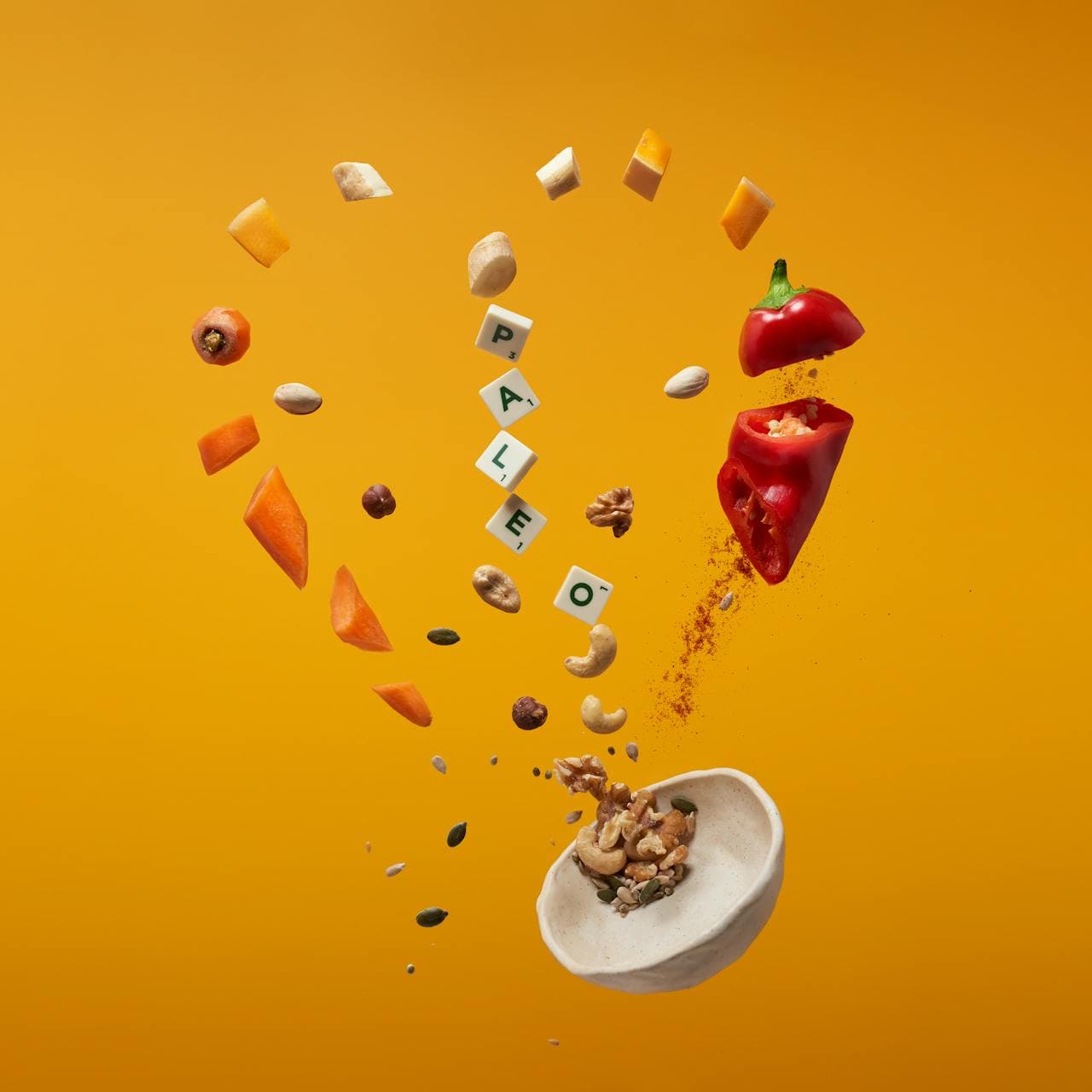 The Paleo bowl contains carrots, pepper, and nuts.